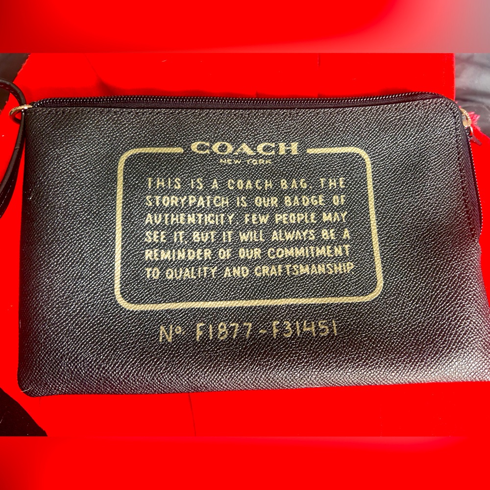 Coach pouchette/wristlette